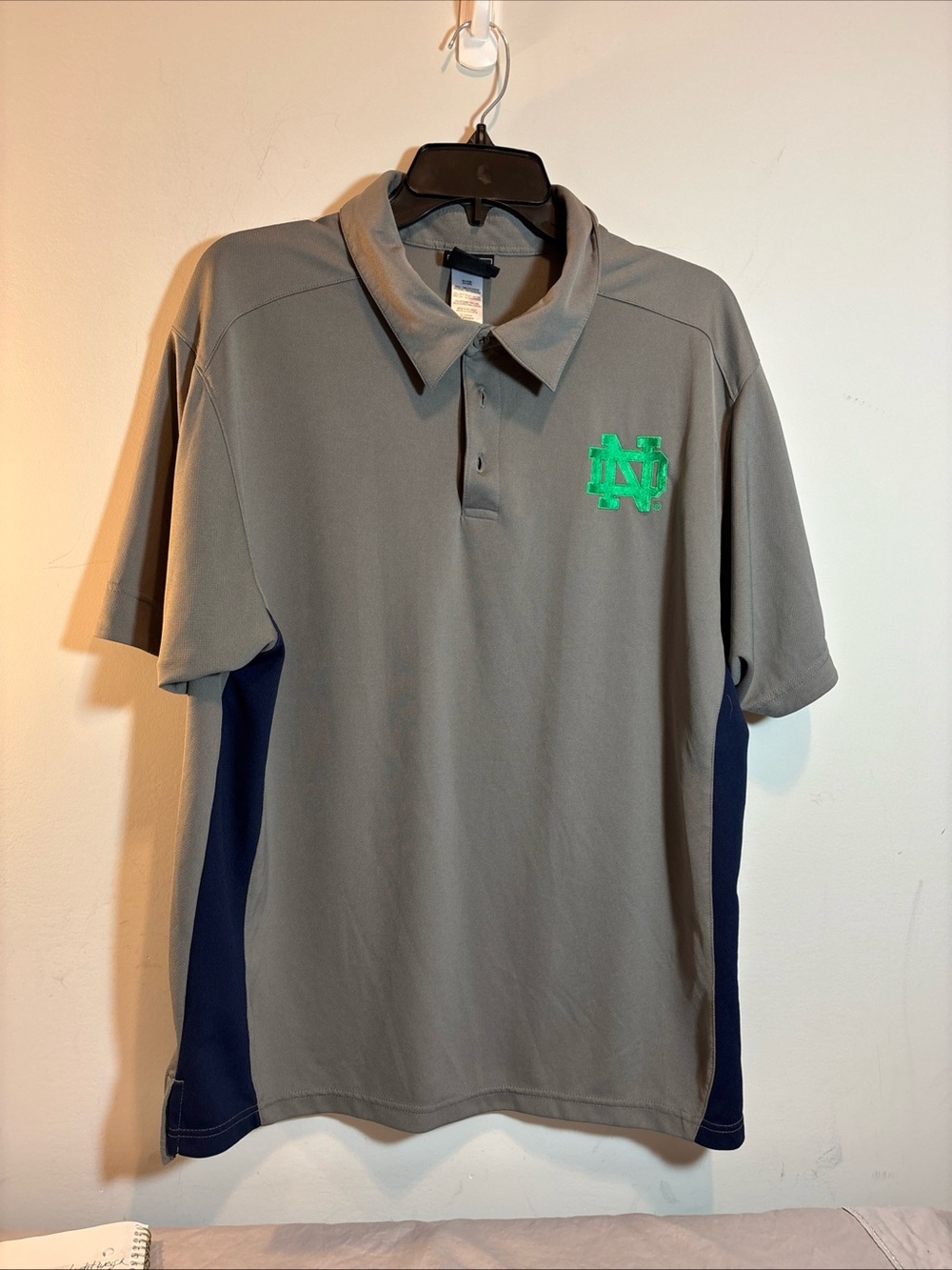 Note Dame Men's Gray Polo Shirt with Green Logo. 692